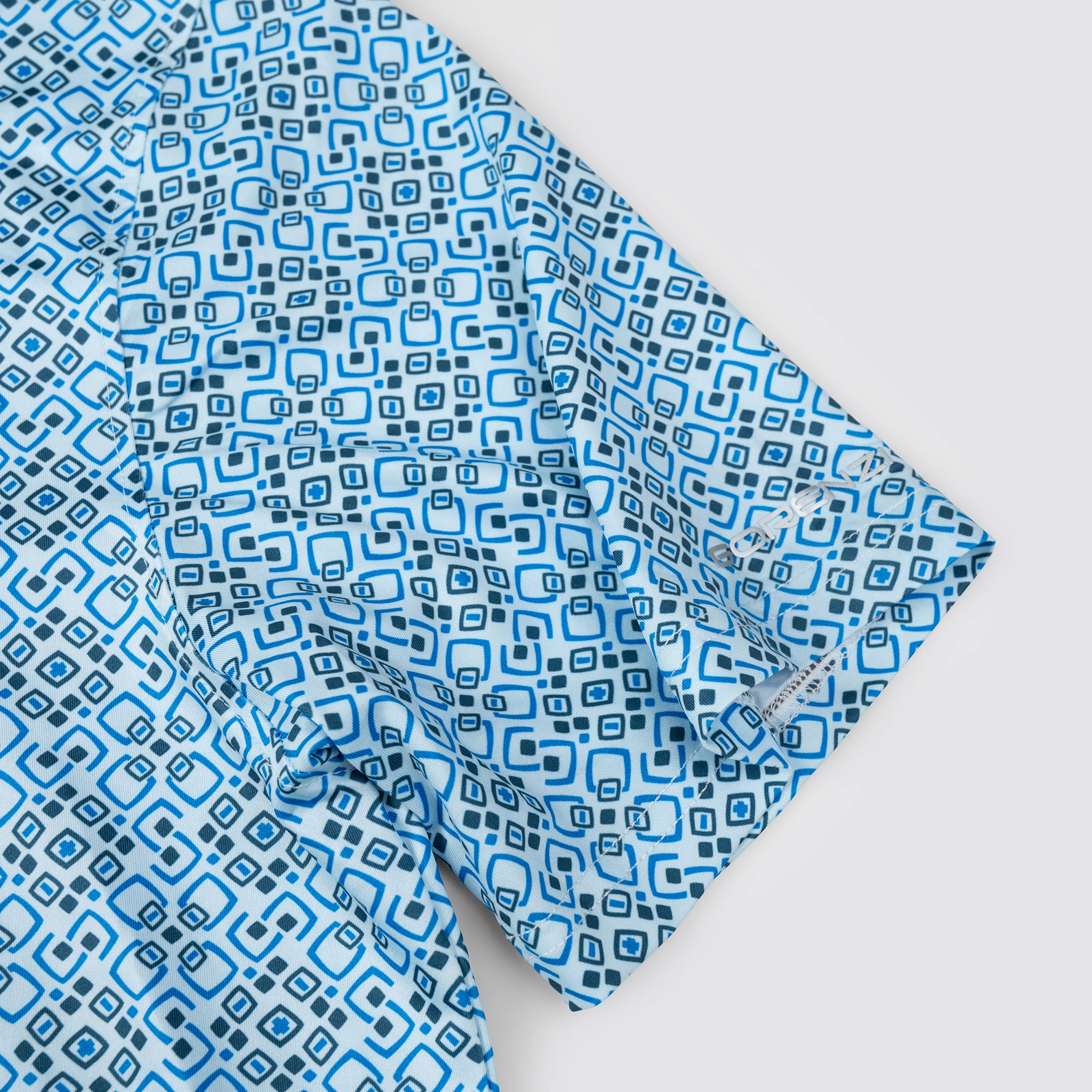 Blue Geo Tile Men’s Performance Golf Polo