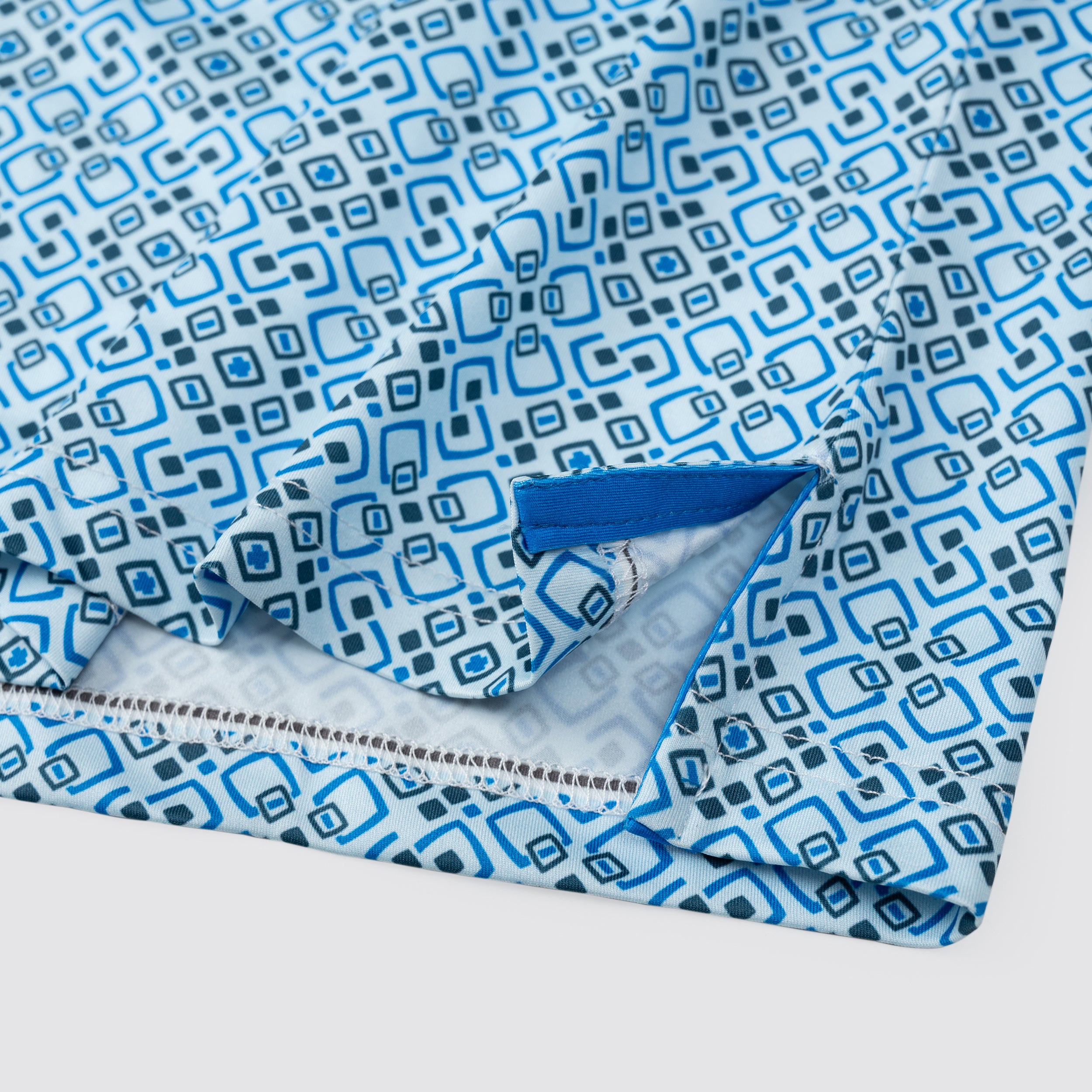 Blue Geo Tile Men’s Performance Golf Polo