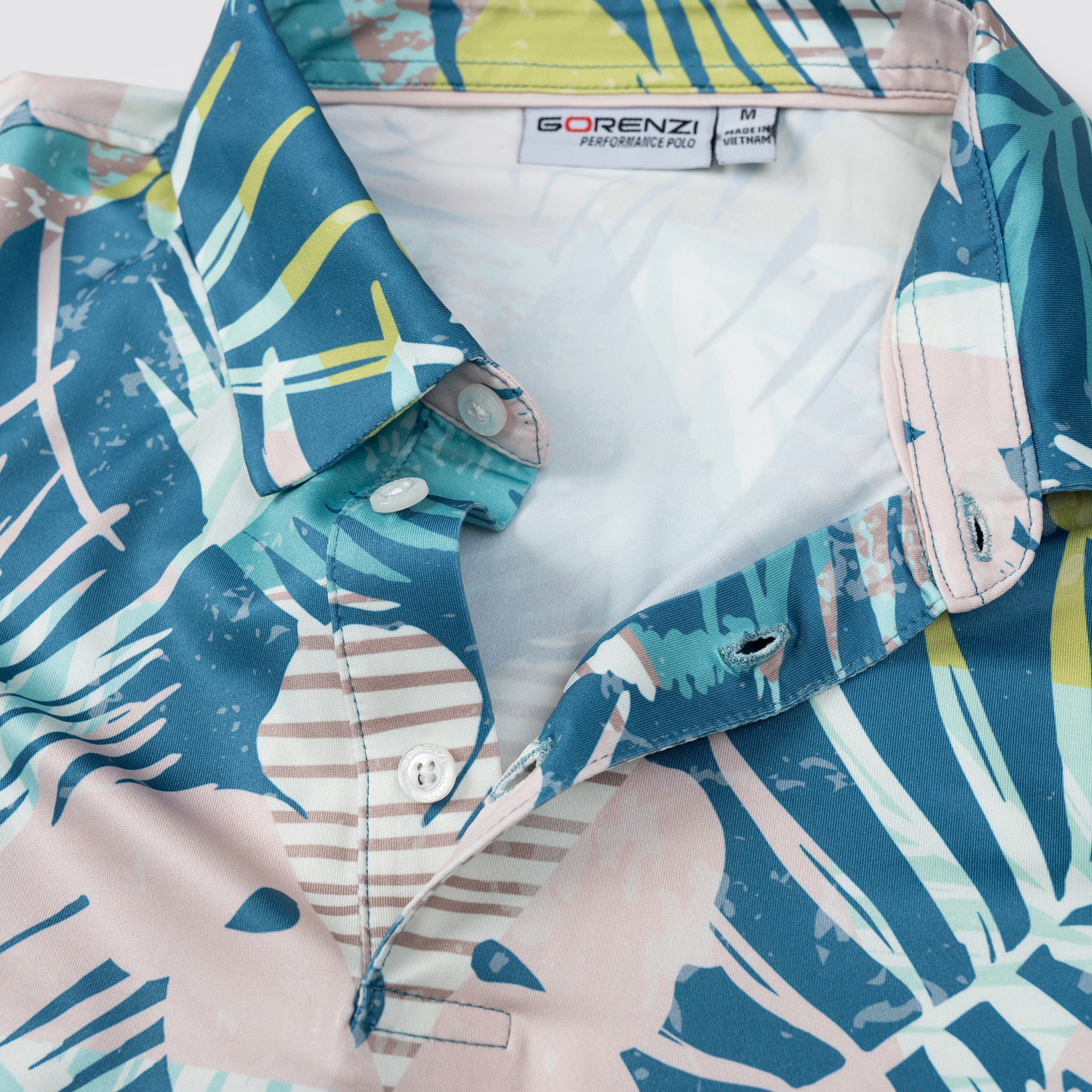 Blue Geometric Floral Men’s Performance Golf Polo