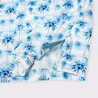 Sky Blue Tropical Palm Men’s Performance Golf Polo