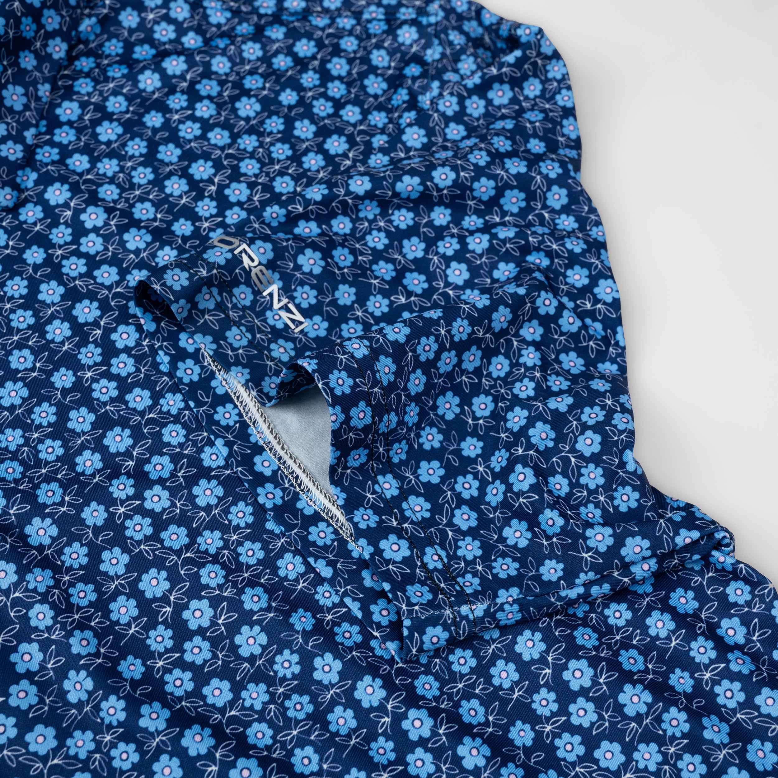 Navy Tropical Floral Men’s Performance Golf Polo