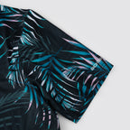 Midnight Tropical Leaf Men’s Performance Golf Polo