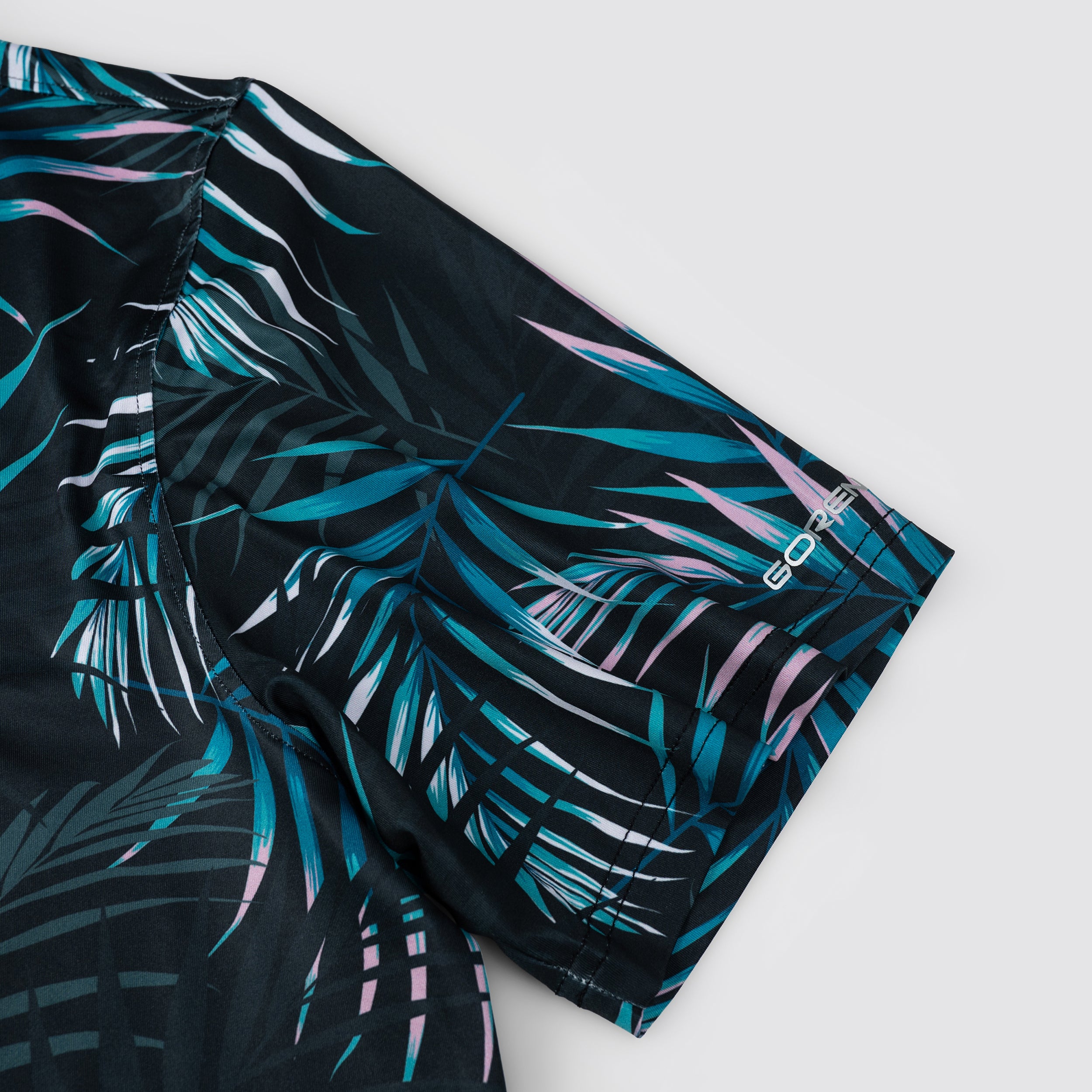 Midnight Tropical Leaf Men’s Performance Golf Polo