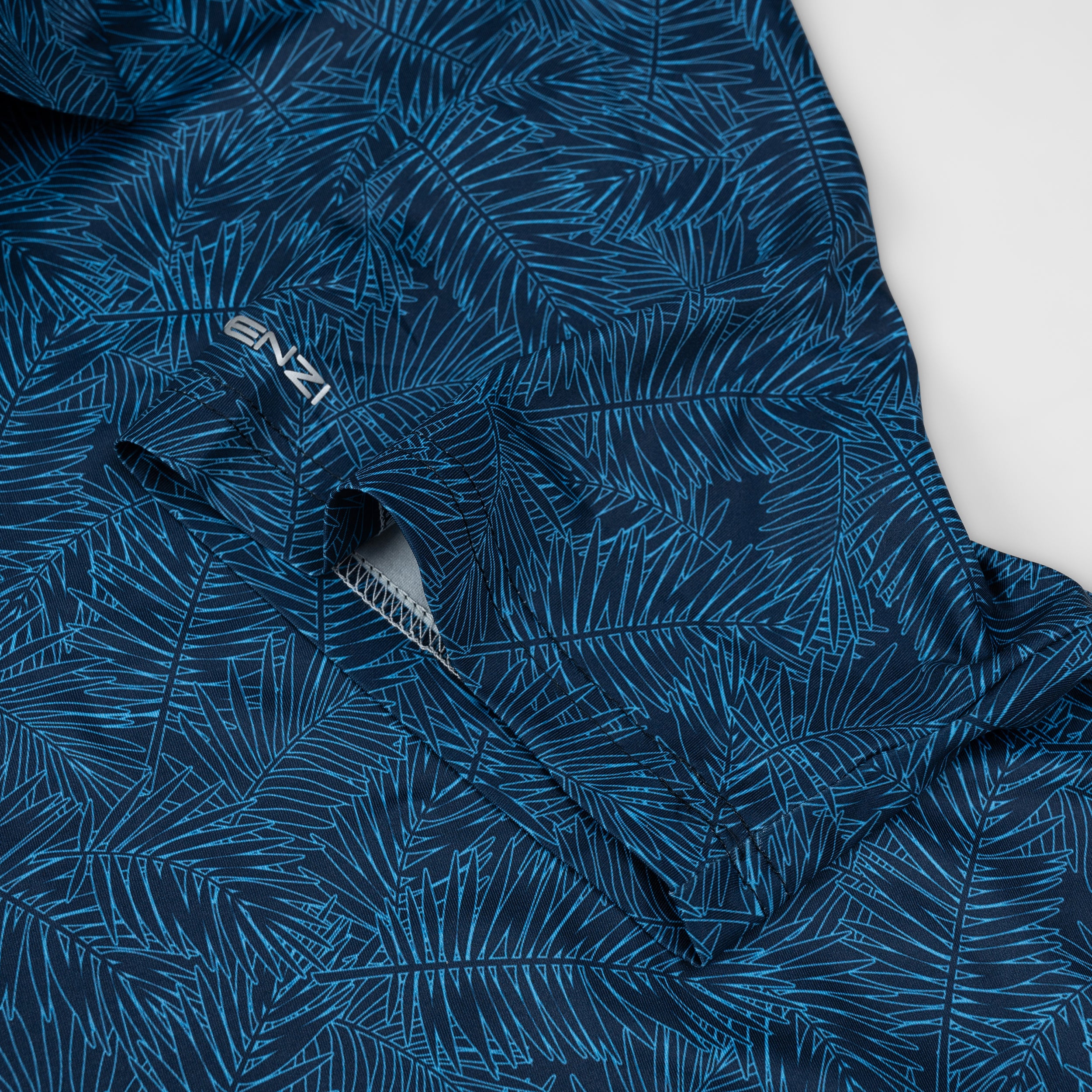 Deep Blue Tropical Leaf Men’s Performance Golf Polo