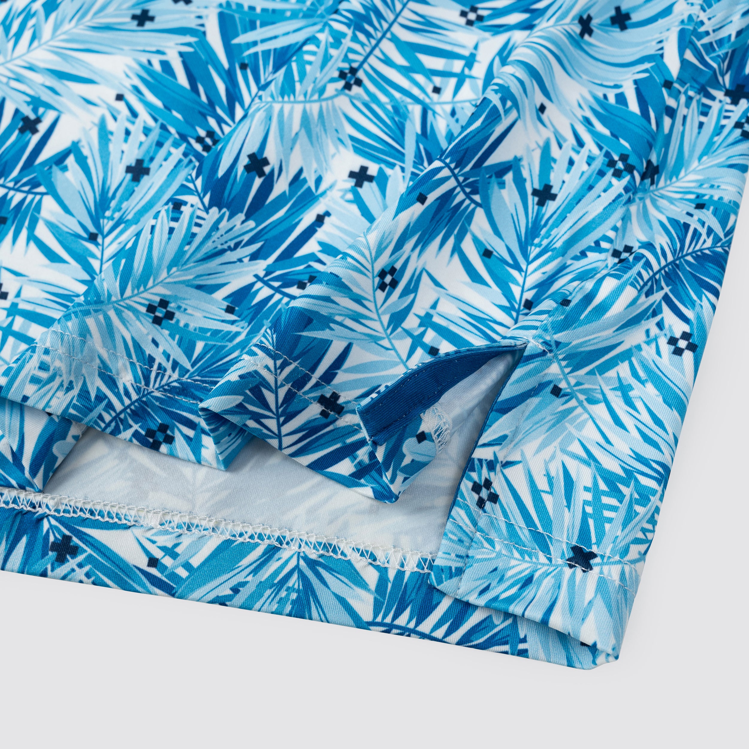 Sky Blue Tropical Leaf Men’s Performance Golf Polo